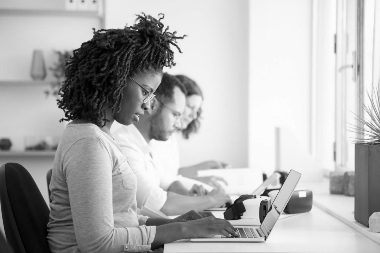 Workshop session showing financial analysts collaborating on corporate finance models